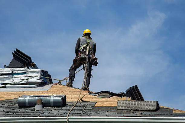 Professional Roof Installation technician working in Dover, MA